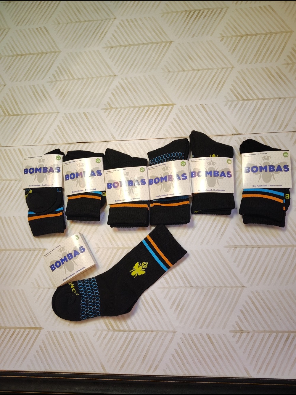 Bombas Black Crew Socks with Orange, Blue and Lime Accents Xs